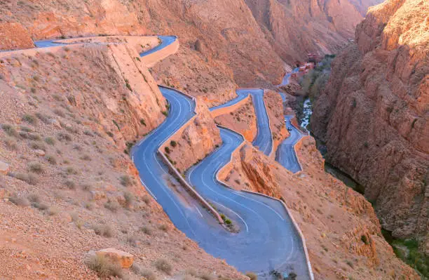 Scenic view of Tsedrine bends winding through the Moroccan mountains, Majesty Morocco Tours